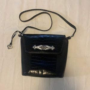 Brighton handbag with woven leather strap.